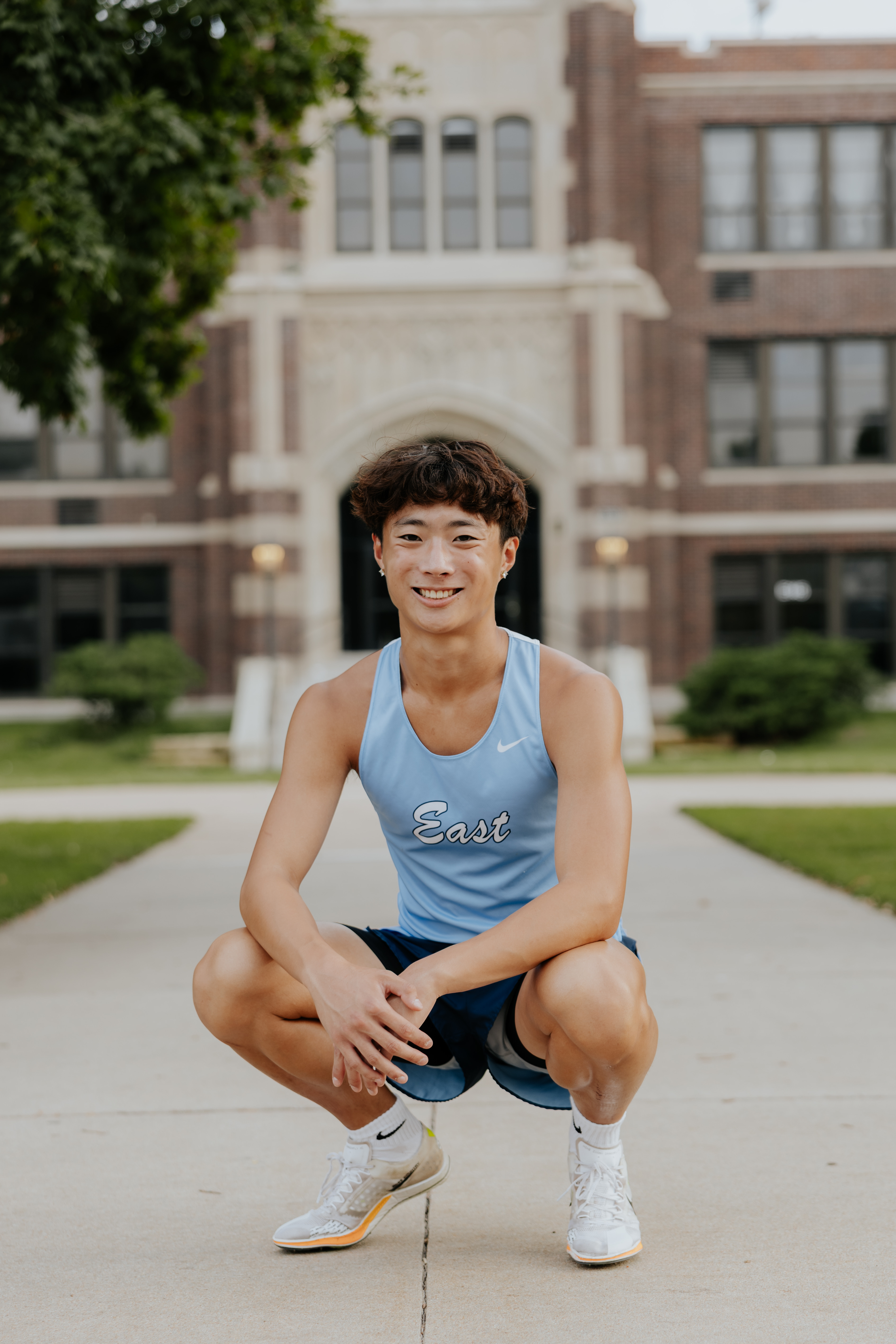 samuel meuhling in front of Wichita East High School